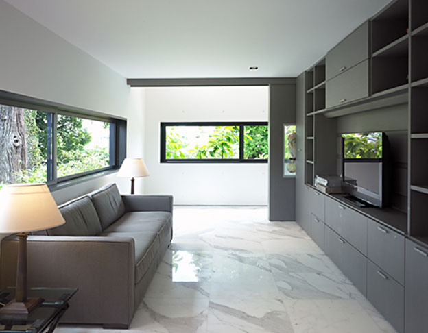 Carrara marble floor and custom made bookshelf